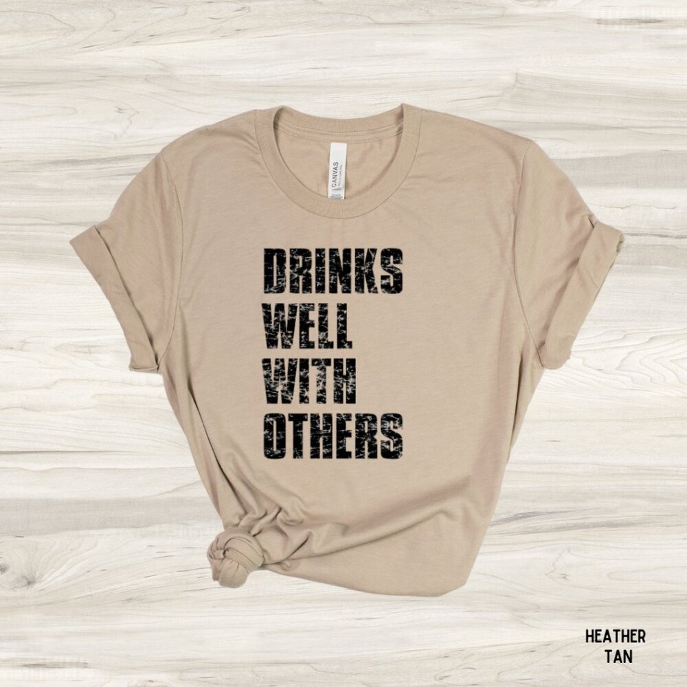 NWT Bella Canvas Unisex Graphic Tee Pour Drinks Well With Others Tan Medium